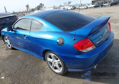 2005 Hyundai Tiburon Gt/Se z USA, uszkodzony, nr VIN KMHHN65F75U167469